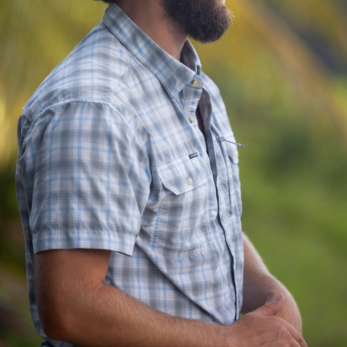 closeup of grey plaid short sleeve shirt