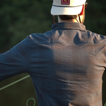 back of blue and black flannel