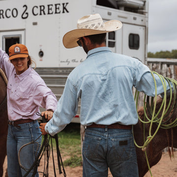 Cowboys wearing denim shirts