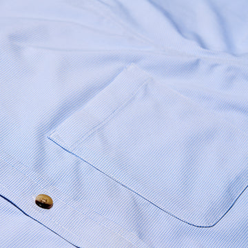 pocket of blue microcheck button up shirt