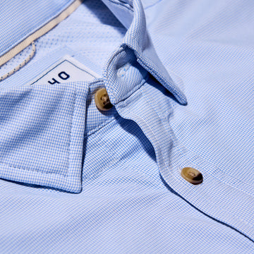 collar of blue micro check button up shirt