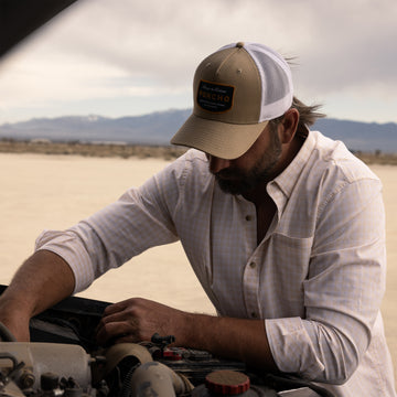 Man fixing car in Baja