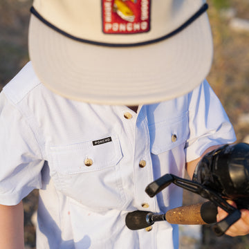 Kid holding fishing pole