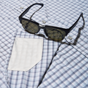 closeup of blue plaid sunglasses cleaner