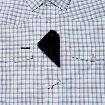 closeup of phone going into pocket