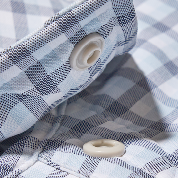 closeup of blue plaid collar snap