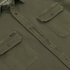 Close-up of the buttoned front and chest pockets on The Buck Snort outdoors shirt in olive green fabric.