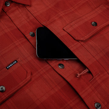 phone in pocket of red flannel
