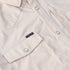 flat lay of tan striped western short sleeve shirt