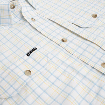 Close up of chest pockets on blue and yellow button down shirt