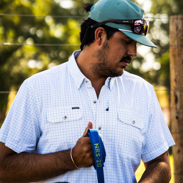 The Cattleman men's Double Blue Check fishing button-down shirt with short sleeves and dual chest pockets