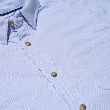 close up of blue micro check plaid pocket