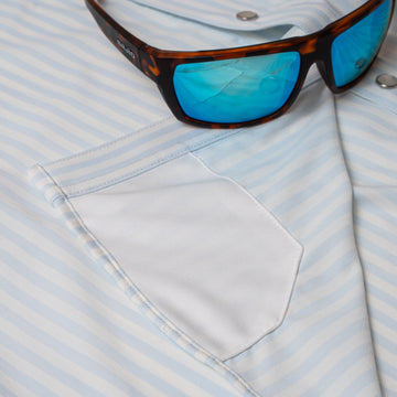 sunglasses and lens wipe on shirt