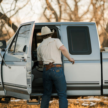 man opening car door