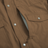 closeup of brown shirt chest pocket
