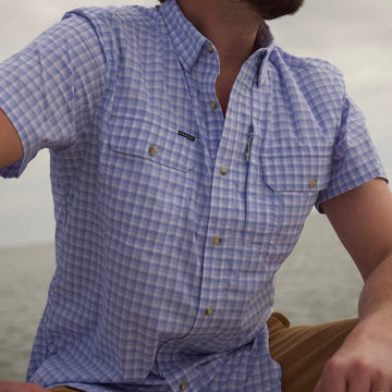 closeup of blue plaid short sleeve shirt