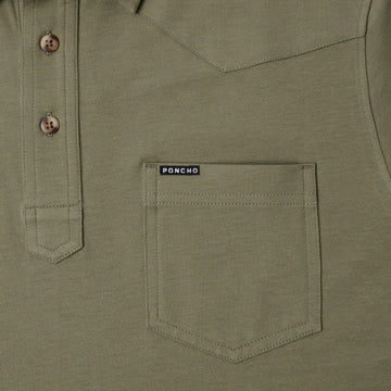 pocket and buttons of green polo sshirt