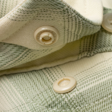 closeup of collar snaps on shirt