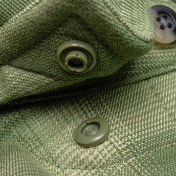closeup of collar snaps on shirt
