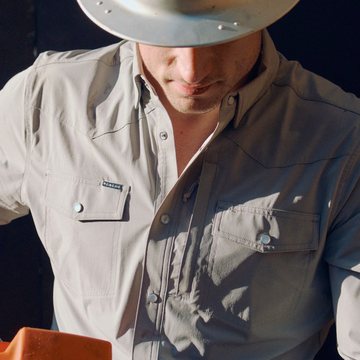 man with hard hat wearing the hot shot shirt