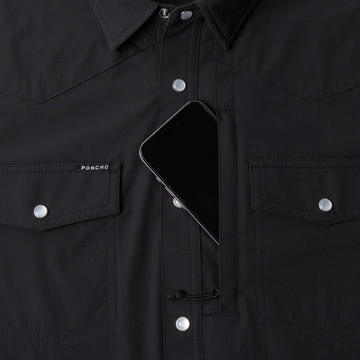 phone in chest zipper pocket of shirt
