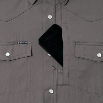 phone in chest zipper pocket of shirt