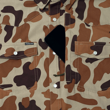 phone in chest zipper pocket of the paloma shirt