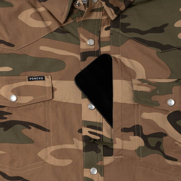 phone in chest zipper pocket of camo shirt