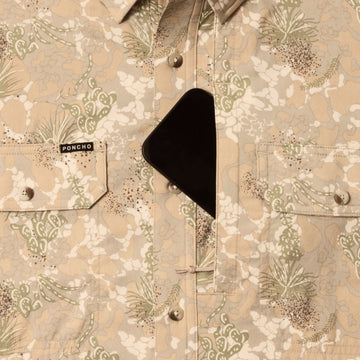 phone in chest zipper pocket of shirt