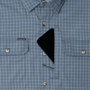 phone in chest zipper pocket of shirt