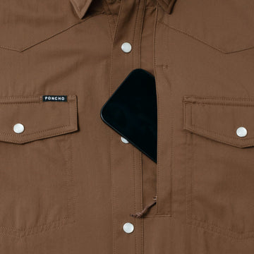 phone in chest zipper pocket of shirt