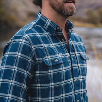 closeup of man wearing the deschutes flannel
