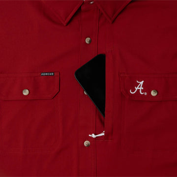 phone in chest zipper pocket of shirt