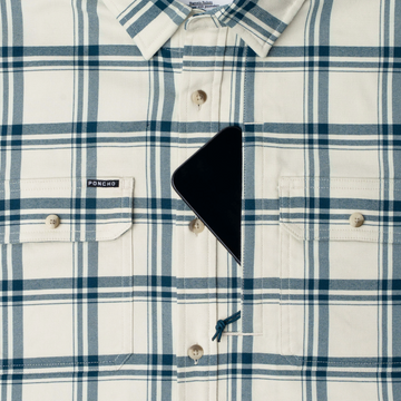 phone in chest zipper pocket of shirt