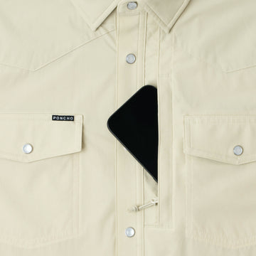 phone in chest zipper pocket of shrit