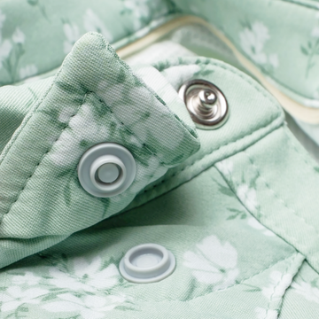 Closeup of collar snaps on collar of shirt