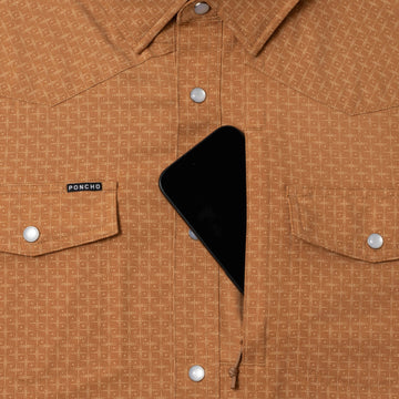 burnt orange shirt with phone in zipper pocket