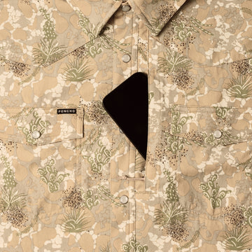 phone in chest zipper pocket of shirt