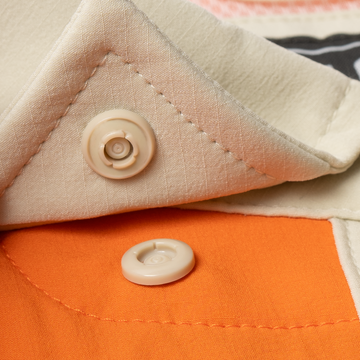 closeup of collar snaps on shirt