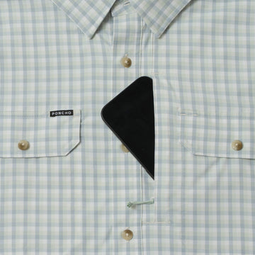 phone in chest zipper pocket of shirt