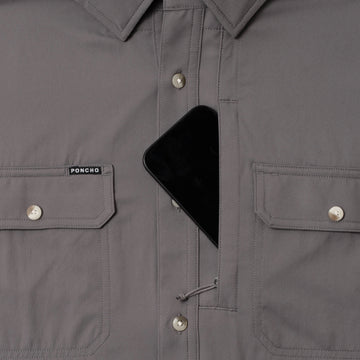 photo of shirt with phone in zipper pocket
