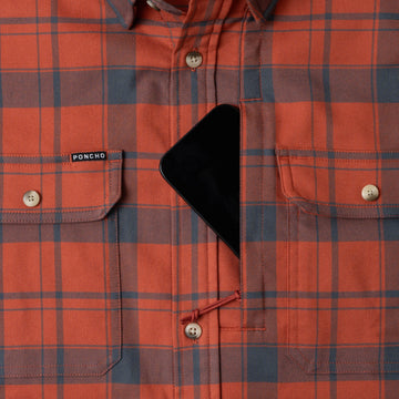 phone in chest zipper pocket of shirt