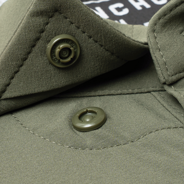 closeup of collar snaps on shirt