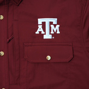 closeup of Texas A&M logo above pocket of shirt
