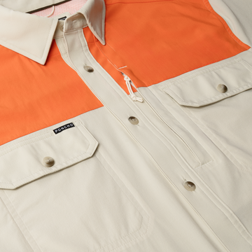 flyover photo of tan blaze patch shirt