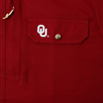 Closeup of OU logo on pocket of shirt
