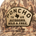 Close-up of a camouflage cap with a fabric patch reading "PONCHO TX US OUTDOORS WILD & FREE" and a silhouette of Texas.