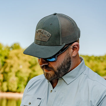 man wearing grey agave trucker hat