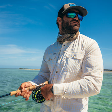 man holding fishing rod