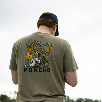 man wearing tan buck t-shirt